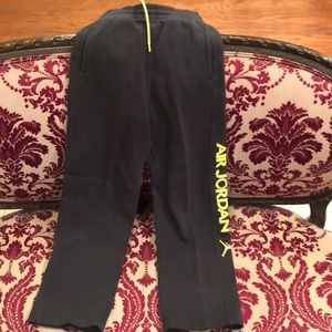 Boys medium air Jordan black and yellow sweatpants